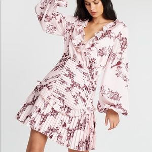 Long sleeved pleated mini dress